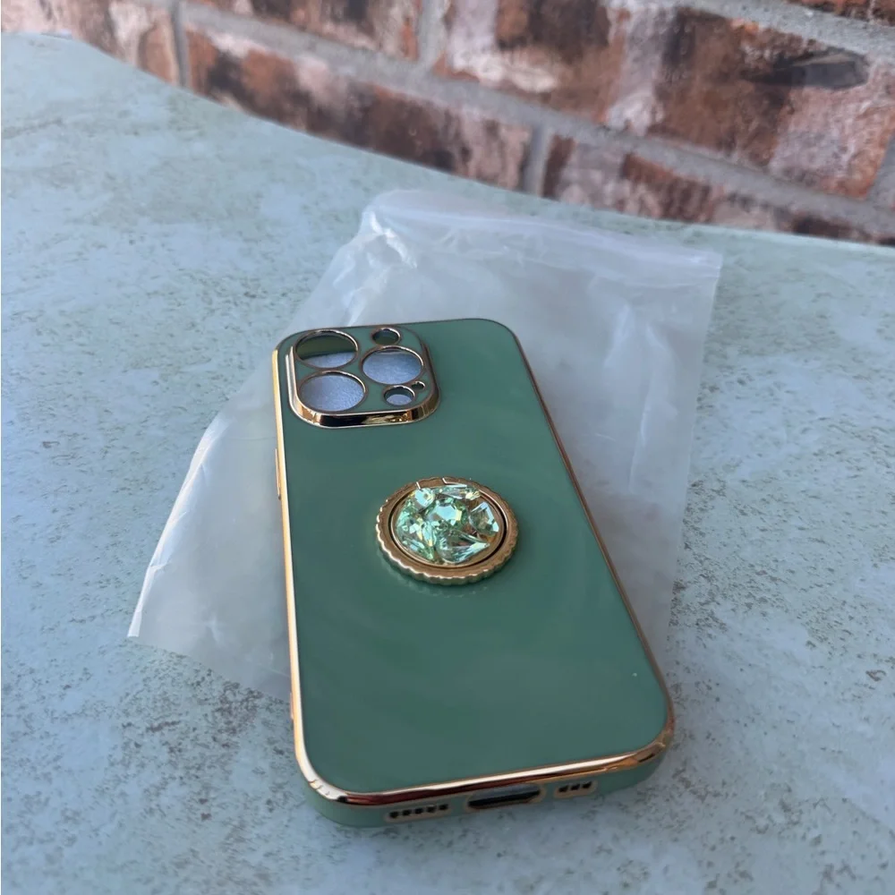 Green iPhone 14 Pro Case with Gold Accents